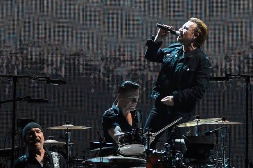 Irish rock band U2 perform during a concert at the D.Y. Patil stadium in Navi Mumbai on December 15, 2019.