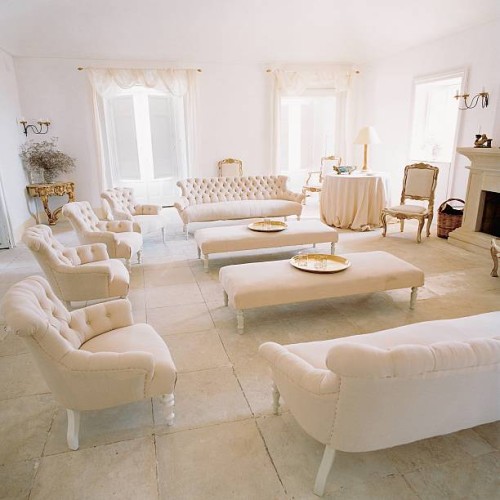 Italian designer Luisa Beccaria's Sicilian Baroque palazzo includes a collection of 18th century restored tufted sofas and arm chairs