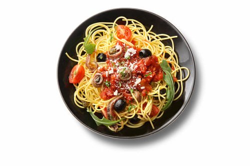 italian ingredients: spaghetti puttanesca - food stock pictures, royalty-free photos & images