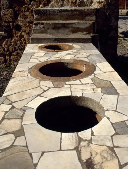 Italy, Pompeii. Marble covered counter Thermopolium. Via Consolare.