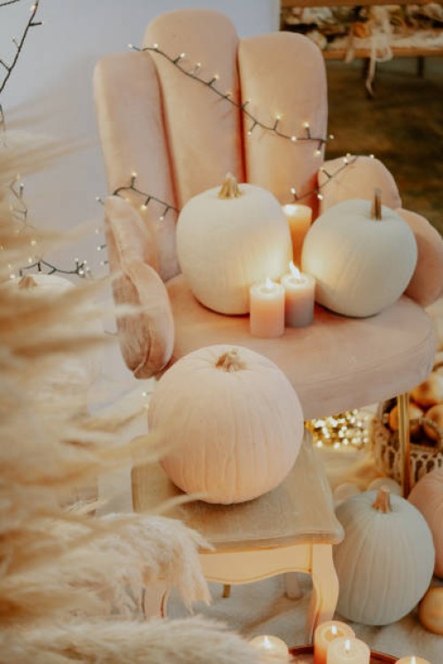 italy, tuscany, arezzo, lit candles and pumpkins on chairs - home decoration stock pictures, royalty-free photos & images