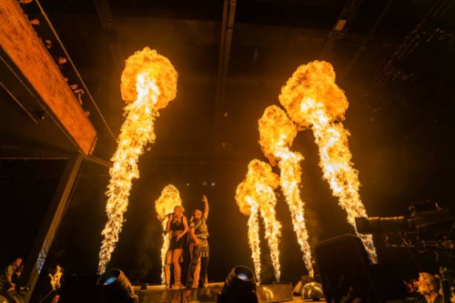 January 2023, Baden-Wuerttemberg, Rust: DJ Bobo and other musicians stand on stage during the premiere of his show at Europa-Park while flames shoot...