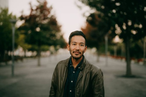 japanese man looking at camera at dusk, tokyo - fashion stock pictures, royalty-free photos & images