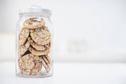 jar of cookies - junk food stockfoto's en -beelden