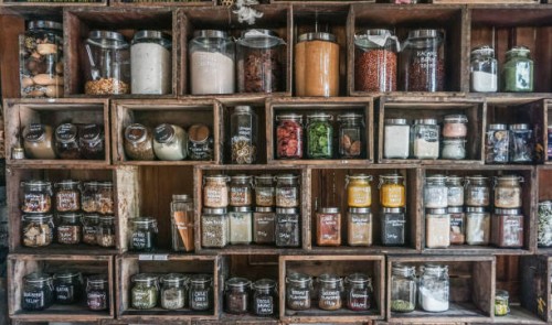 jars containing spices and herbs in diy wooden rack - food stock pictures, royalty-free photos & images