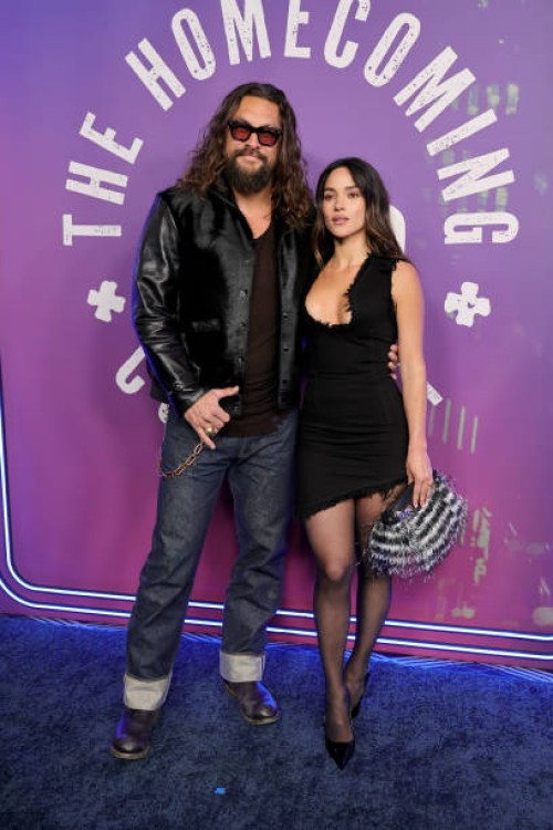 Jason Momoa and Adria Arjona attend SNL50: The Homecoming Concert at Radio City Music Hall on February 14, 2025 in New York City.