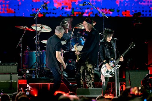 Joan Jett performs onstage with Pat Smear, Dave Grohl, and Krist Novoselic of Nirvana during the FIREAID Benefit Concert for California Fire Relief...