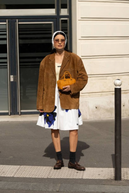 Joanna Horodyńska wears Miu Miu outside the Miu Miu show during Womenswear Spring/Summer 2025 as part of Paris Fashion Week on October 01, 2024 in...
