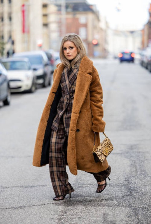 Joicy Muniz wears brown teddy coat J. Lindenberg, brown checkered suit Sophie & Lucie, beige leopard animal print bag Valentino, shoes Bottega Veneta...