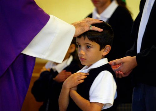 Jonathan Morales receives a blessing from Father Jose Vega, who places his hand on his head instead of giving him a Communion Wafer, because...