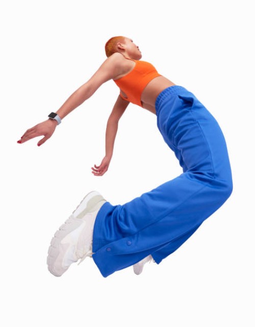 jumping - fashion stock pictures, royalty-free photos & images