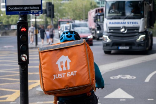 Just Eat takeaway delivery cycle courier on 28th August 2024 in London, United Kingdom. Just Eat Limited is a British online food order and delivery...