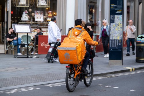 Just Eat takeaway delivery cycle courier on 7th October 2024 in London, United Kingdom. Just Eat Limited is a British online food order and delivery...