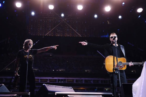 Keith Urban and Eric Church perform onstage at the Concert For Carolina Benefit Concert at Bank of America Stadium on October 26, 2024 in Charlotte,...