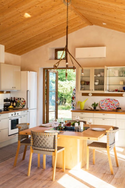 kitchen with dining table - home decoration stock pictures, royalty-free photos & images