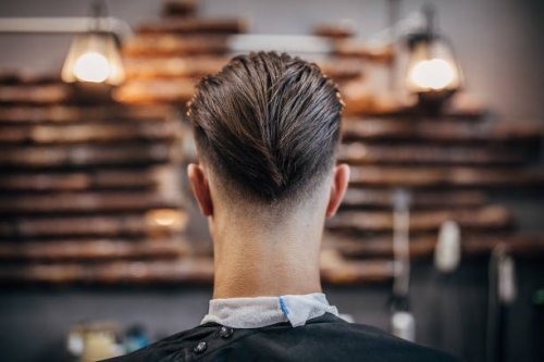 knappe mens met modern kapsel - hairstyle stockfoto's en -beelden