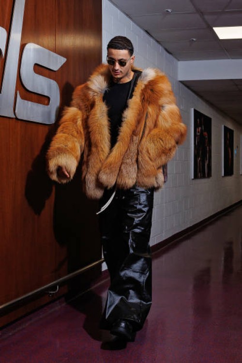Kyle Kuzma of the Washington Wizards arrives to the arena before the game against the Miami Heat on February 2, 2024 at Capital One Arena in...