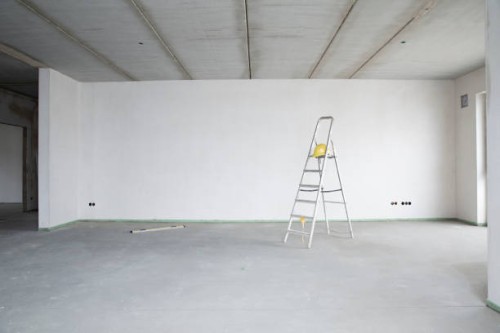 ladder with hardhat against wall in renovating house - home decoration stock pictures, royalty-free photos & images
