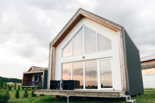 large beautiful country house with large windows. - garden decoration stock pictures, royalty-free photos & images