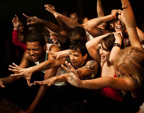 large crowd reaching towards stage - concert stock pictures, royalty-free photos & images