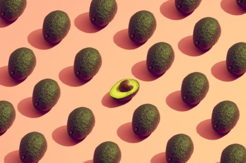 large group of avocados placed in a pattern - food stock pictures, royalty-free photos & images