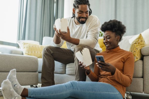 lazy day at home and ordering food online - junk food stock pictures, royalty-free photos & images