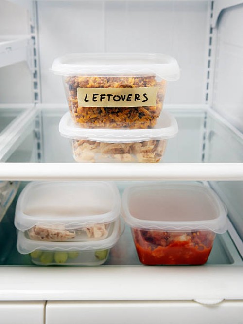 leftover containers in refrigerator - food stock pictures, royalty-free photos & images
