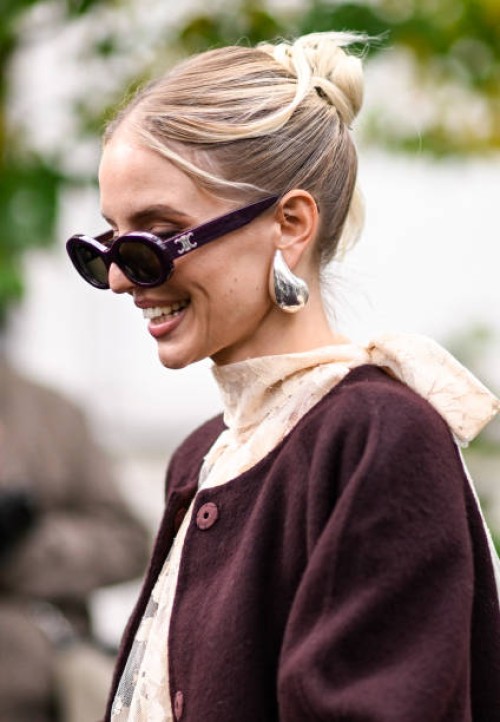 Leonie Hanne is seen wearing Celine sunglasses outside the Zimmermann show during Womenswear Spring/Summer 2025 as part of Paris Fashion Week on...