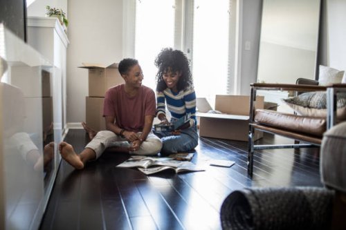 lesbian couple picking paint colors for new home - home decoration stock pictures, royalty-free photos & images
