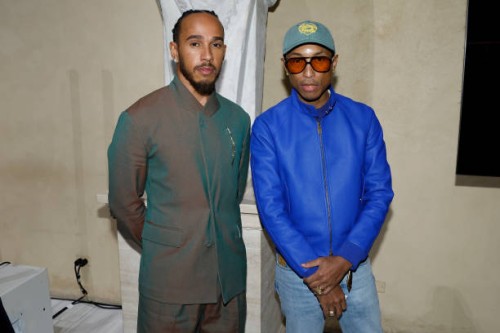 Lewis Hamilton and Pharrell Williams attend a press conference announcing the Spring 2025 Costume Institute exhibition "Superfine: Tailoring Black...