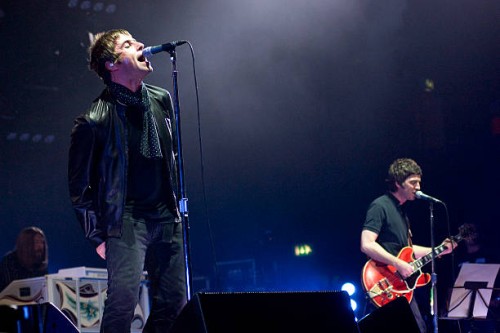 Liam Gallagher and Noel Gallagher of English rock band Oasis, live on stage at the Wembley Arena, October 16, 2008.