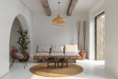 living room interior with sofa, wicker armchair, cactus plant and coffee table - home decoration stock pictures, royalty-free photos & images