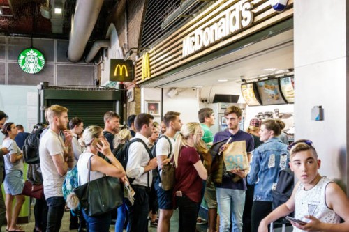London, Waterloo Station, long lines at McDonald's.