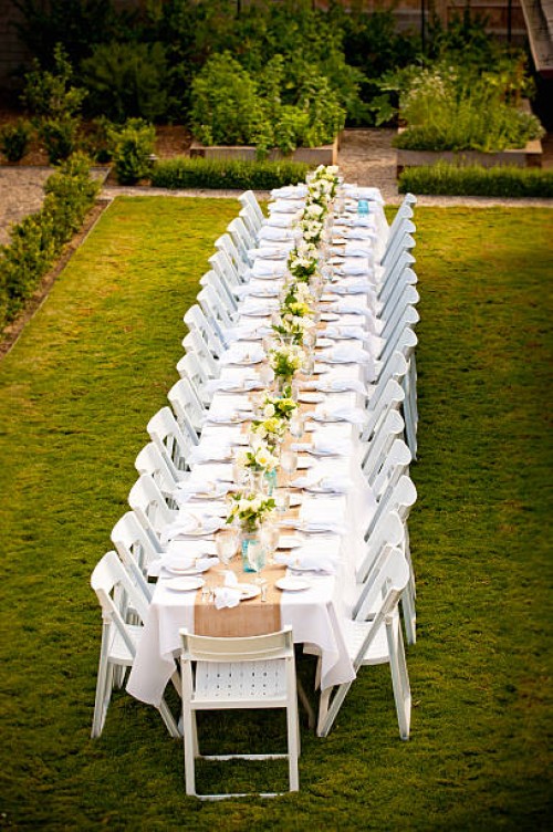 long elegantly set white table, outdoors - garden decoration stock pictures, royalty-free photos & images