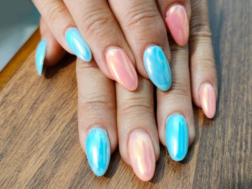 long fingernails in light blue and pink iridescent colors - nails art stock pictures, royalty-free photos & images