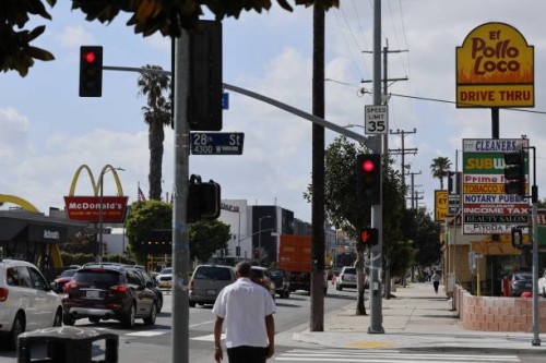 Los Angeles, CA A view of fast food restaurants on Crenshaw Blvd including Taco Bell, McDonald's, Yoshinoya, Subway, El Pollo Loco, Little Caesers,...