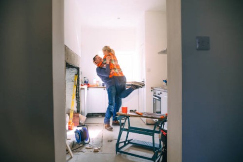 loving their new home - home decoration stock pictures, royalty-free photos & images