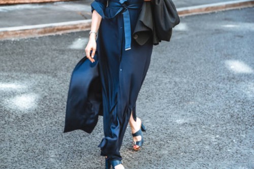 low section elegant fashionable woman walking at the street - fashion stock pictures, royalty-free photos & images