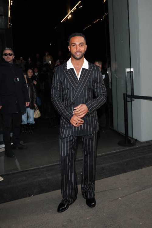 Lucien Laviscount arrives at the Dolce & Gabbana fashion show during the Milan Menswear Fall/Winter 2025 - 2026 Fashion Week on January 18, 2025 in...