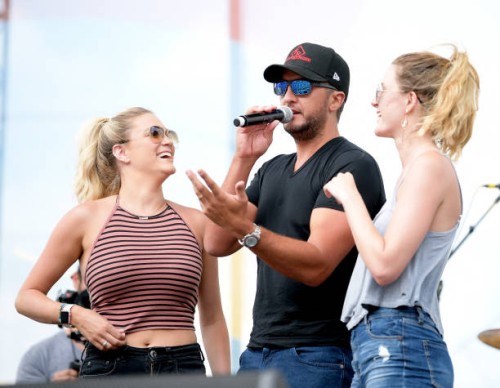 Luke Bryan surprises two fans with tickets to his concert tonight at Nissan stadium during the 2018 CMA Music festival at the Chevy Riverfront Stage...