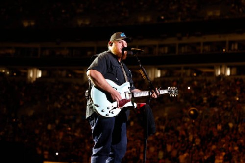 Luke Combs performs onstage at the Concert For Carolina Benefit Concert at Bank of America Stadium on October 26, 2024 in Charlotte, North Carolina.