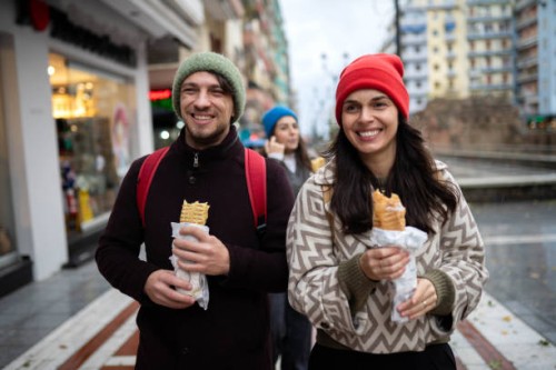 lunch time on the move - junk food stock pictures, royalty-free photos & images