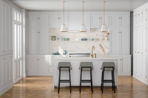 luxury kitchen interior with white cabinets, kitchen island and stools - food stockfoto's en -beelden