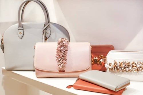 luxury purses on display - fashion stock pictures, royalty-free photos & images