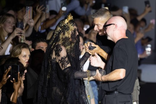 Madonna, Domenico Dolce and Stefano Gabbana are seen on the runway at the Dolce & Gabbana fashion show during the Milan Womenswear Spring/Summer 2025...