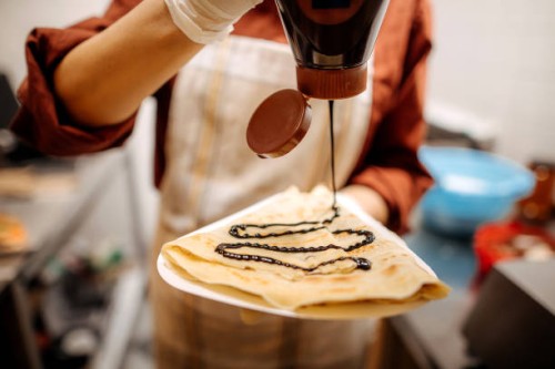 making pancakes - junk food stock pictures, royalty-free photos & images