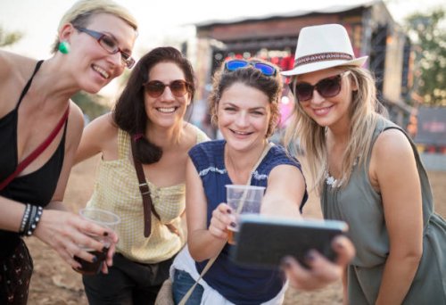 making selfie at summer festival - concert stock pictures, royalty-free photos & images