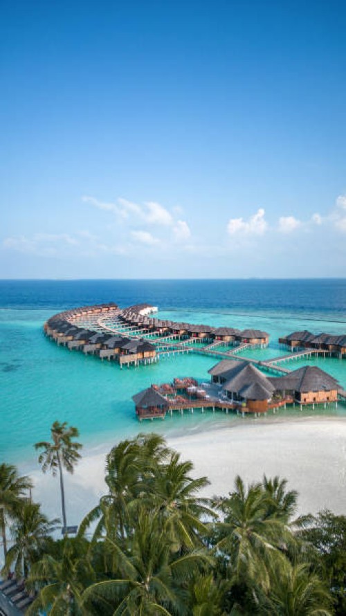 maldives hotel beach resort on tropical island with aerial drone view - travel stock pictures, royalty-free photos & images