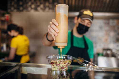 male chef preparing salad - junk food stock pictures, royalty-free photos & images