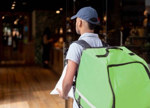 man delivering food - junk food stock pictures, royalty-free photos & images